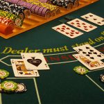 winning-blackjack-hand-on-casino-table-520257696-58979c263df78caebc19a6e7